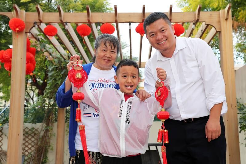 Can Cai with son Tiancheng Cai and mother Ying Luo at his villa in Dubai. Pawan Singh / The National 