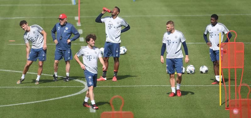 Bayern Munich's Jerome Boateng with teammates during training. Reuters