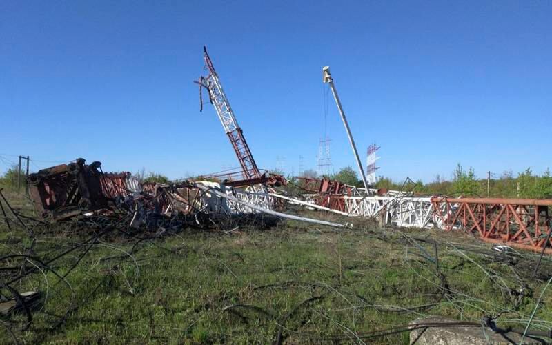 The destroyed radio antennas lie on the ground in Maiac, in the Moldovan separatist region of Transnistria on April 26. AP