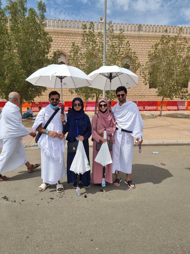 Anas Misri (L) with his wife, and Abbas Misri, also with his wife. They recently got married and are performing Hajj together as a family. Photo: Mariam Nihal / The National