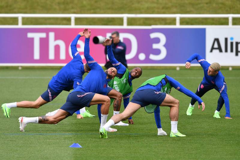 Kyle Walker, Raheem Sterling and Phil Foden take part in a training session at St. George's Park ahead of the Euro 2020 match against Croatia. AFP