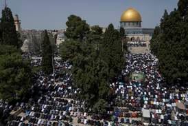 Muslims offer prayer on the first Friday of Ramadan outside the Dome of Rock Mosque at Al Aqsa compound in Jerusalem's Old City. AP
