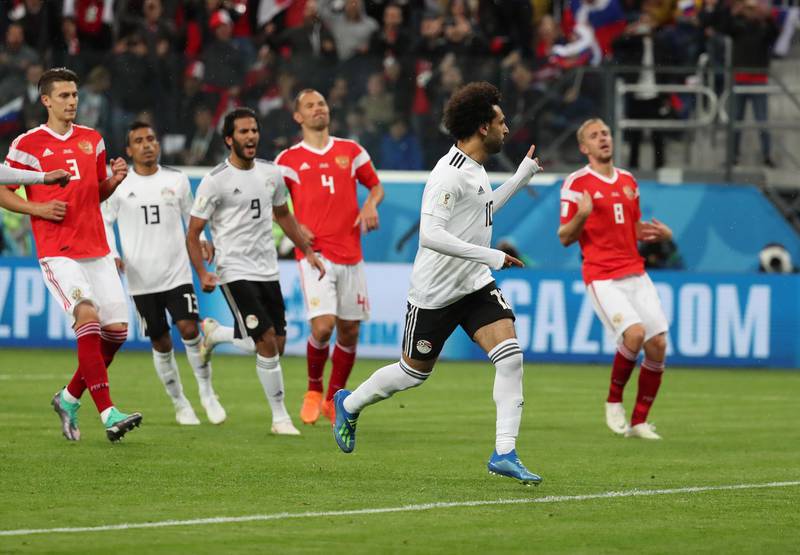 Mohamed Salah reacts after scoring against Russia. Georgi Licovski   / EPA
