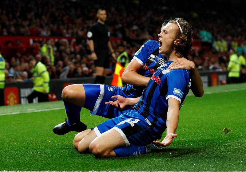 Soccer Football - Carabao Cup - Third Round - Manchester United v Rochdale - Old Trafford, Manchester, Britain - September 25, 2019  Rochdale's Luke Matheson celebrates scoring their first goal         Action Images via Reuters/Jason Cairnduff  EDITORIAL USE ONLY. No use with unauthorized audio, video, data, fixture lists, club/league logos or "live" services. Online in-match use limited to 75 images, no video emulation. No use in betting, games or single club/league/player publications.  Please contact your account representative for further details.