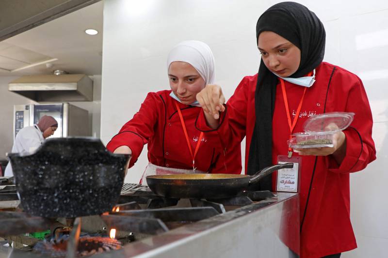 Palestinian chefs take part in a cooking competition at the Aida refugee camp in Bethlehem in the occupied West Bank.