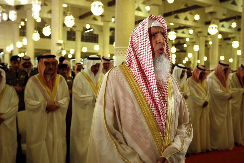 Saudi Arabia's Grand Mufti Abdulaziz Al Sheikh prays at the Imam Turki bin Abdullah mosque in Riyadh during Eid Al Fitr morning prayers on September 9, 2010. Hassan Ammar, File/AP Photo