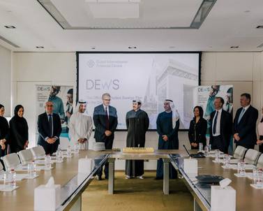 Executives from Zurich and the DIFC at the Dews launch ceremony. On-boarding for the workplace savings scheme is now live. Courtesy: Zurich