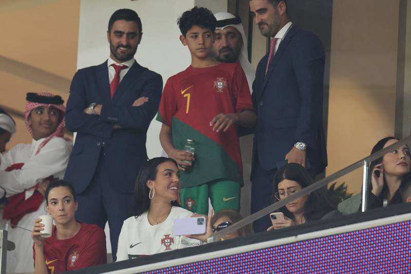 Rodriguez, bottom, and son Cristiano Ronaldo Jr, centre, attend the World Cup quarterfinal match between Morocco and Portugal at the Al-Thumama Stadium in Doha. AFP