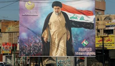 A poster of Mr Al Sadr in the Sadr City district of Baghdad.  Reuters