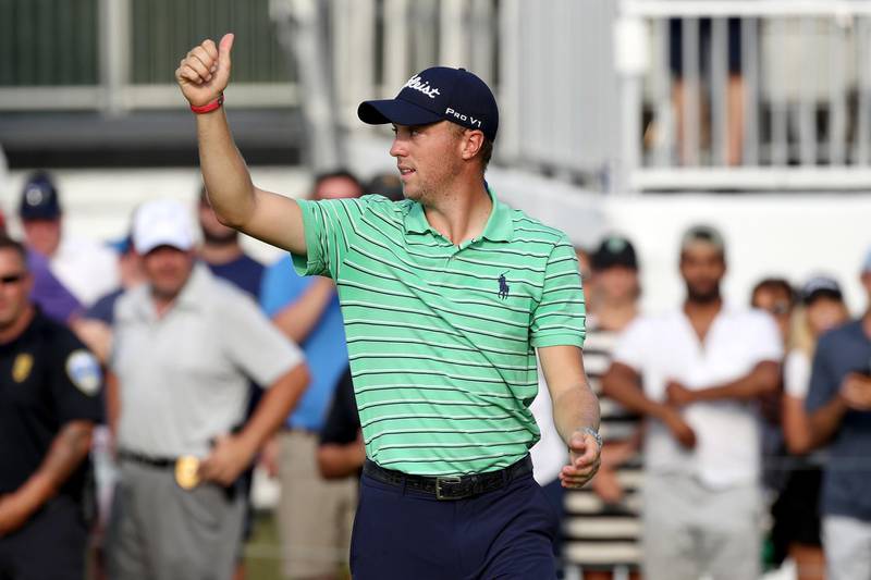 AKRON, OH - AUGUST 05: Justin Thomas waves to the crowd after winning the World Golf Championships-Bridgestone Invitational at Firestone Country Club South Course on August 5, 2018 in Akron, Ohio.   Gregory Shamus/Getty Images/AFP
== FOR NEWSPAPERS, INTERNET, TELCOS & TELEVISION USE ONLY ==
