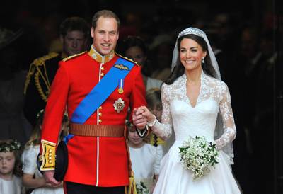 Britain's Prince William (L) and Catherine, Duchess of Cambridge, are seen walking after their wedding ceremony in Westminster Abbey in central London in this April 29, 2011 file photograph. Britain's Prince William and his wife Catherine are expecting a baby, the prince's office said on December 3, 2012.    (ROYAL WEDDING/VIP)   REUTERS/Toby Melville/Files   (BRITAIN - Tags: ENTERTAINMENT SOCIETY ROYALS TPX IMAGES OF THE DAY)