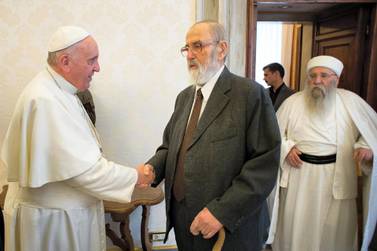 Yazidi leader Prince Tahseen Said Ali meets Pope Francis at the Vatican in January 2015. Osservatore Romano / AFP
