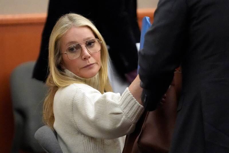 In court, she changed into vintage-style metal-rimmed glasses by Caddis. Reuters 