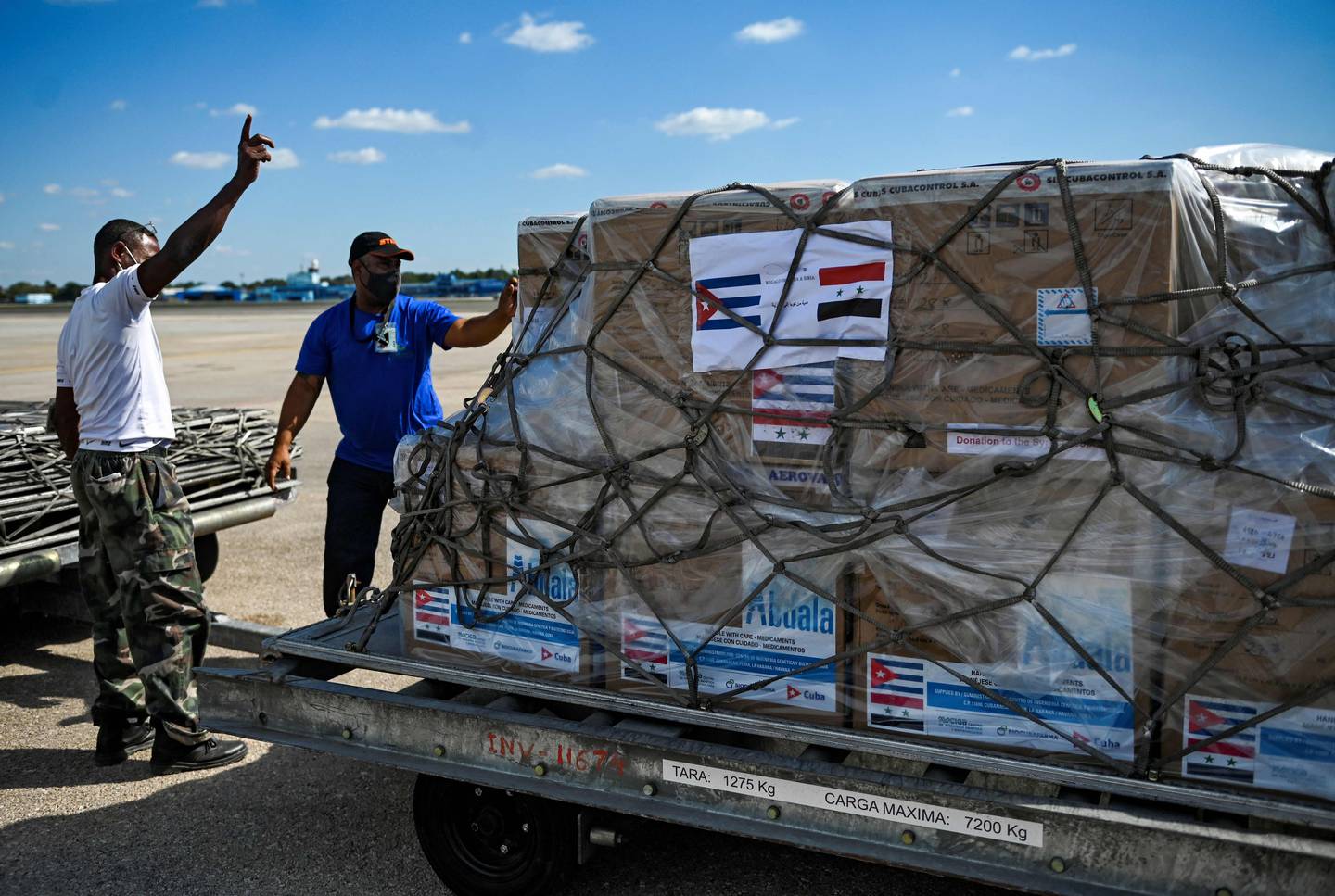 Workers transport a shipment of the Cuban Soberana Plus vaccine to Syria from Jose Marti International Airport in Havana. Photo: AFP