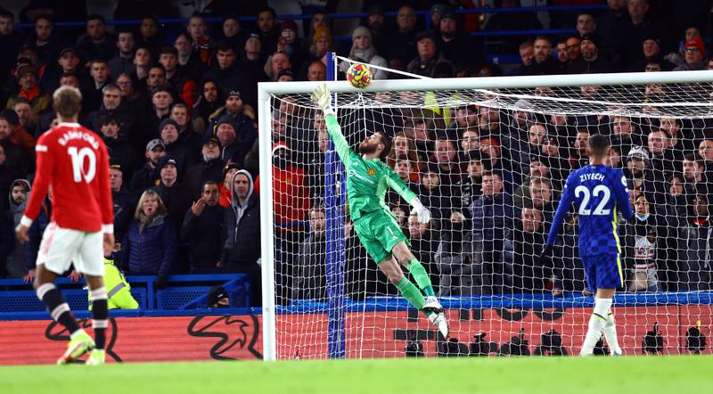 Manchester United goalkeeper David de Gea tips a save over the crossbar. Reuters