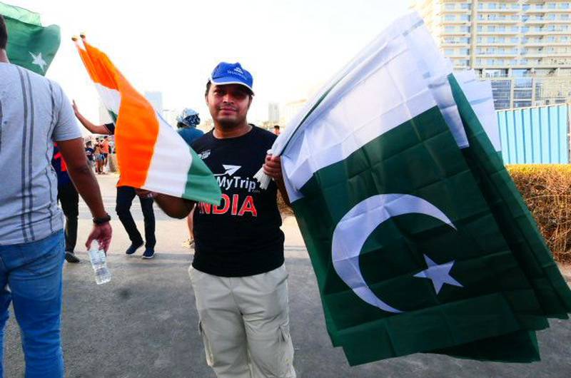 Fans of India and Pakistan's cricket teams together before their Asia Cup 2022 match. Pawan Singh / The National