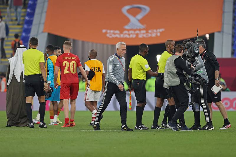 UAE coach Bert van Marwijk walks off the pitch following their win. AFP