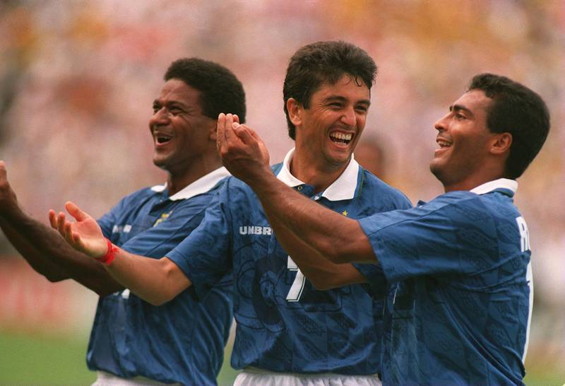 9 Jul 1994: BEBETO #7 OF BRAZIL IS JOINED IN HIS SAMBA CELEBRATIONS BY ROMARIO RIGHT AND MAZINHO LEFT AFTER SCORING THE SECOND GOAL AGAINST HOLLAND DURING THE 1994 WORLD CUP QUARTER FINAL MATCH AT THE COTTON BOWL STADIUM IN DALLAS, TEXAS.