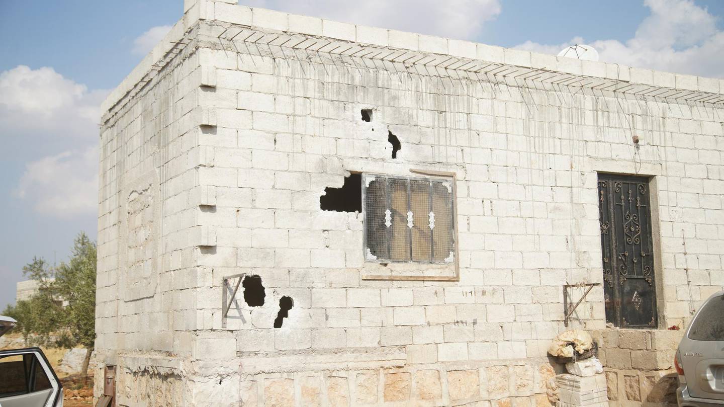epa07955653 A view of a damaged structure at the site that was hit by helicopter gunfire which reportedly killed nine people, including Abu Baker al-Baghdadi, the leader of IS or so-called Islamic State, near the village of Barisha, Idlib province, Syria, 27 October 2019 (issued 28 October 2019).  EPA/YAHYA NEMAH