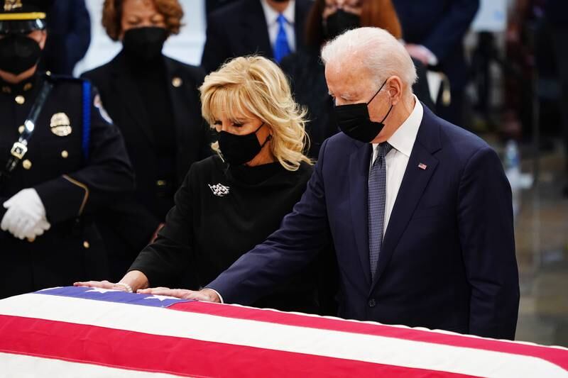 Mr and Mrs Biden at the casket of former senator Robert J Dole in Washington on December 9. EPA