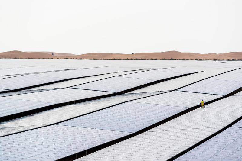 Taqa's 1.2-gigawatt Noor Abu Dhabi solar park. The company will generate more than 30 per cent of its power from renewable sources by 2030. Taqa
