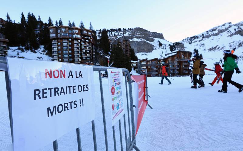 A placard which reads 'No to retirement in death' is displayed as workers at the French ski resort Avoriaz  protest. Reuters