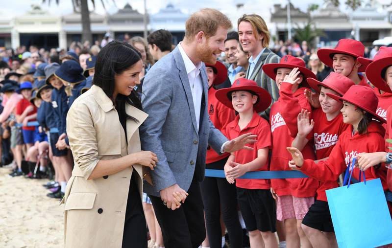 The royal couple visit primary school students at South Melbourne beach. EPA