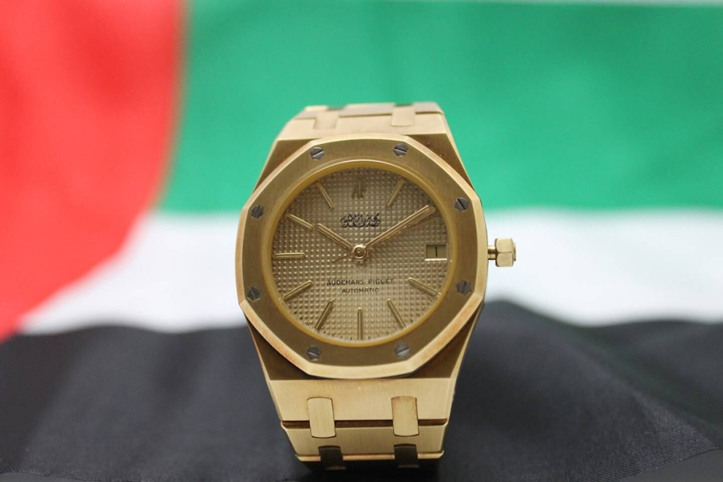 A handout photo of Audemars Piguet Royal Oak in 18k gold, dated early 1980s, which features a tropical dial with the engraving â€˜Mohammed Bin Rashid Al Maktoumâ€™ (in Arabic characters). (Courtesy: Christie's Images) *** Local Caption ***  AL19SE-CROWNS-AUDEMARS.JPG