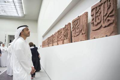SAADIYAT ISLAND, ABU DHABI, UNITED ARAB EMIRATES -September 11, 2017: HH Sheikh Abdullah bin Zayed Al Nahyan, UAE Minister of Foreign Affairs and International Cooperation (L) views the Epigraphic frieze, during a tour of the Louvre Abu Dhabi. 
( Mohamed Al Raeesi for Crown Prince Court - Abu Dhabi )
---