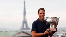 Rafael Nadal poses with French Open title in Paris with Eiffel Tower as backdrop - in pictures