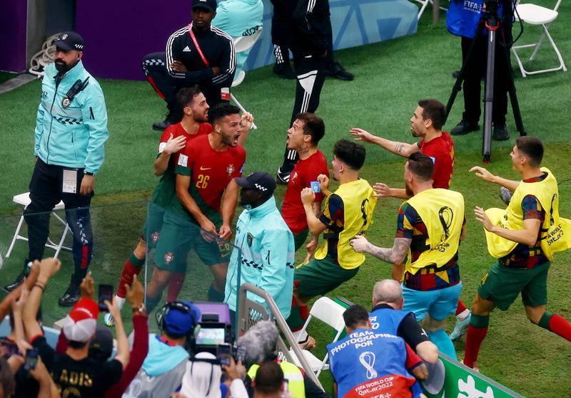 Portugal's Goncalo Ramos celebrates scoring  with teammates. Reuters