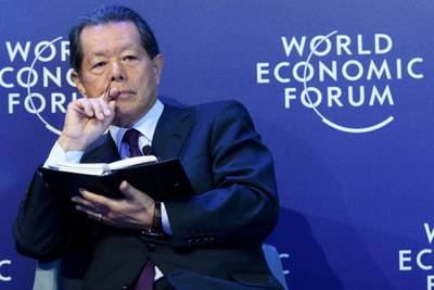 Japanese Yoichi Funabashi chairman of the Asia Pacific Initiative (API) speaks during a panel session during the 48th Annual Meeting of the World Economic Forum in Davos. Laurent Gillieron / EPA