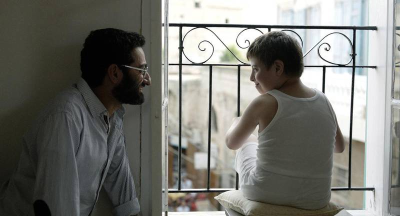 Georges Khabbaz, left, in Ghadi, a film about a boy with Down syndrome, played by Emmanuel Khairallah, right, whose parents devise a fanciful plan to get the village folk to accept their son. Courtesy The Talkies