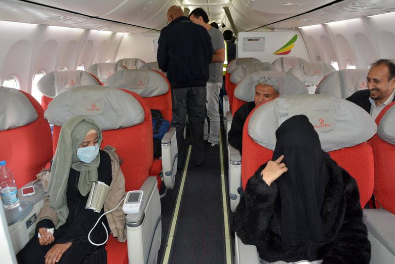 Sick Yemenis board a UN medical evacuation plane at Sana'a airport, Yemen.  EPA
