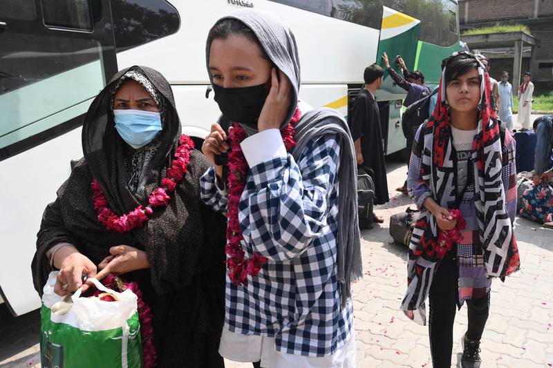 Afghanistan's national women's football team arrive in Lahore. AFP