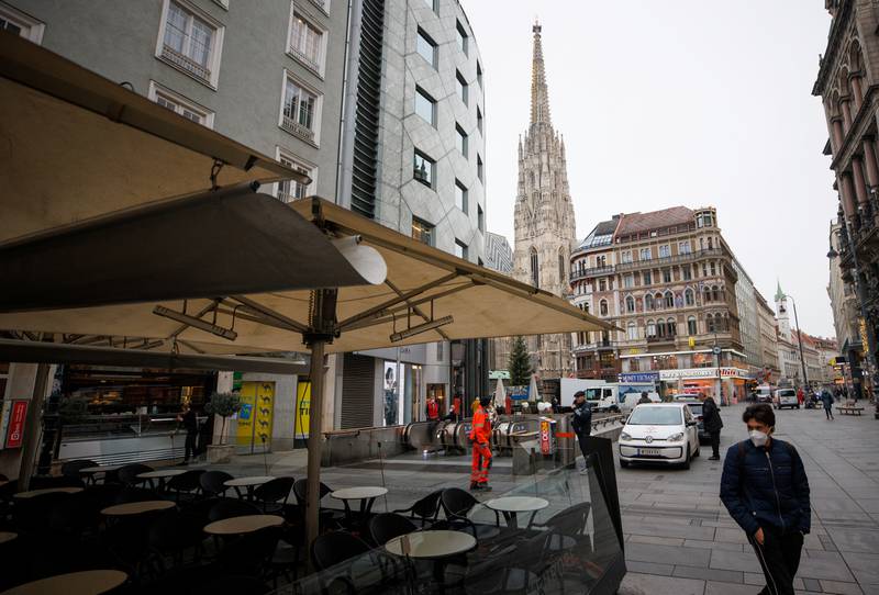 Empty tables at a closed restaurant near St Stephen's Cathedral, a major tourist attraction in Vienna. Reuters