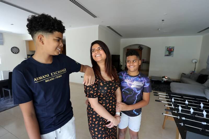 Poonam Nnabuogor at home in Jumeirah Park with sons Simon, 13, and Ethan 10. Photos: Chris Whiteoak / The National