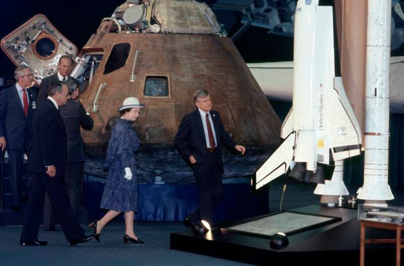 Queen Elizabeth and Prince Philip view the Apollo 14 module and space shuttle model in Downey, California, on February 28, 1983. Getty Images
