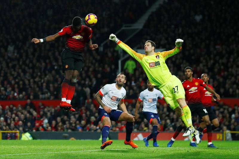 Manchester United's Paul Pogba scores his and United's second goal past Bournemouth's Asmir Begovic. Reuters