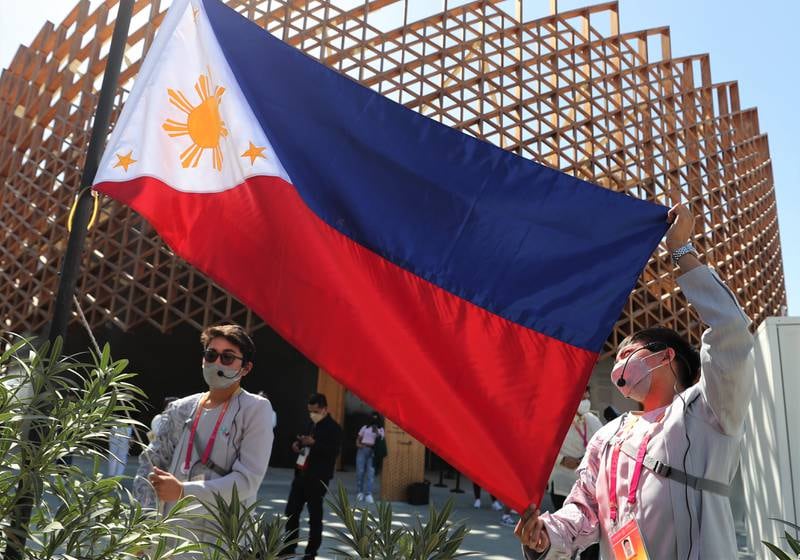 The Philippines flag flutters in the breeze.