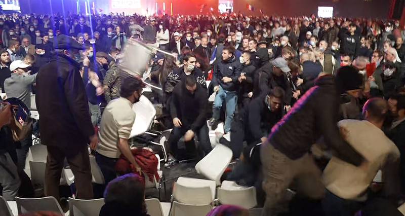 SOS Racisme activists clash with supporters of Eric Zemmour at the end of the campaign rally in Villepinte. AFP