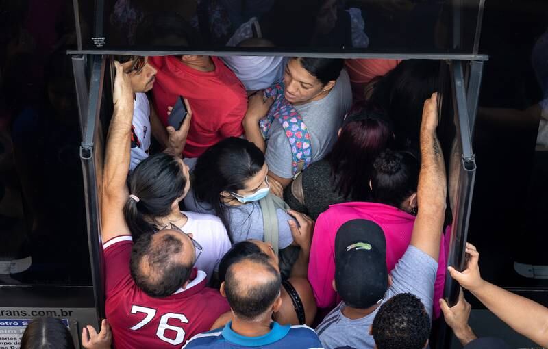 People cram into the doorway of a bus amid a strike by subway workers in Sao Paulo, Brazil. EPA 