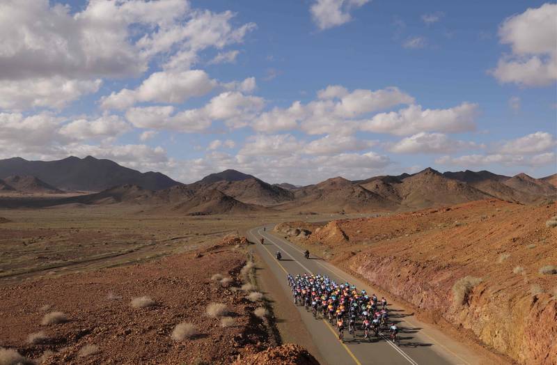The pack rides during the third stage of the 2023 Saudi Tour