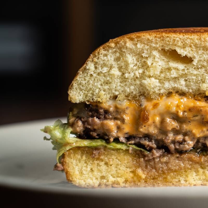 There are two burger options on the menu, a Waguy beef cheeseburger and a second with the addition of shaved truffle. Photo: 3 Fils