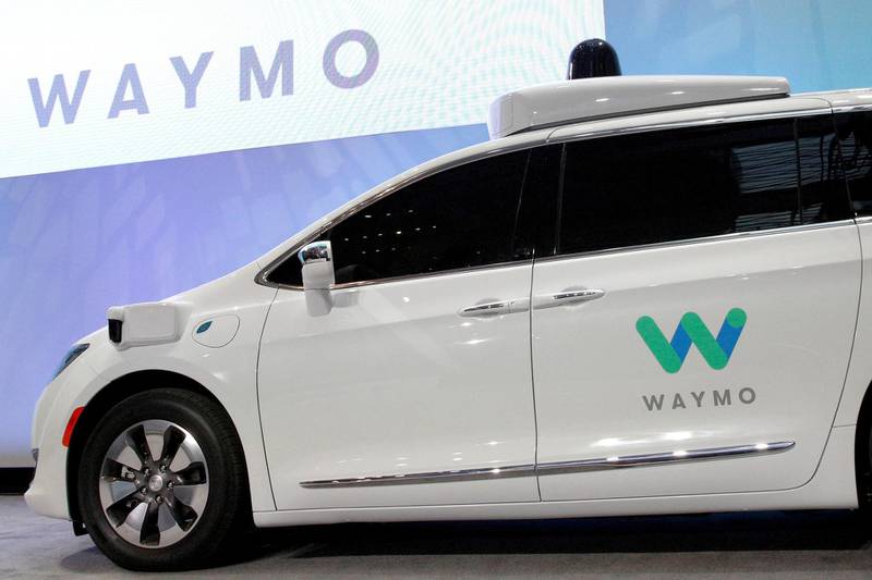 FILE PHOTO: Waymo unveils a self-driving Chrysler Pacifica minivan during the North American International Auto Show in Detroit, Michigan, U.S., January 8, 2017.  REUTERS/Brendan McDermid/File Photo