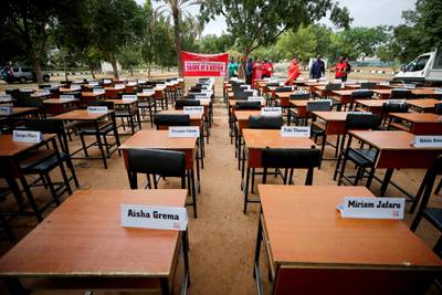 Names of missing Chibok school girls kidnapped by Boko Haram in 2014 displayed during the 5th year anniversary of their abduction, in Abuja, Nigeria, in 2019. Reuters