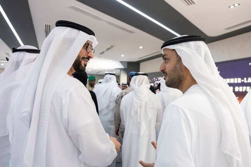 Sheikh Sultan bin Hamdan, the UAE's ambassador to Bahrain, left, and Sheikh Mohammed bin Hamad, adviser for Special Affairs at the Ministry of the Presidential Court, tour the airshow.