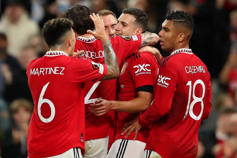 Diogo Dalot of Manchester United celebrates with teammates after scoring the first goal. Getty