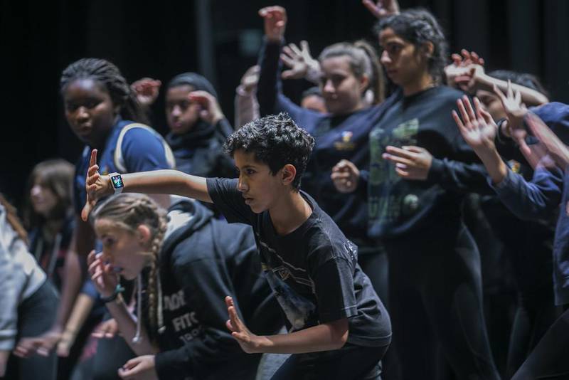 Lead dancer Saif Al Owais, 12, forefront, works on choreography with his fellow Cranleigh pupils. Mona Al Marzooqi / The National 