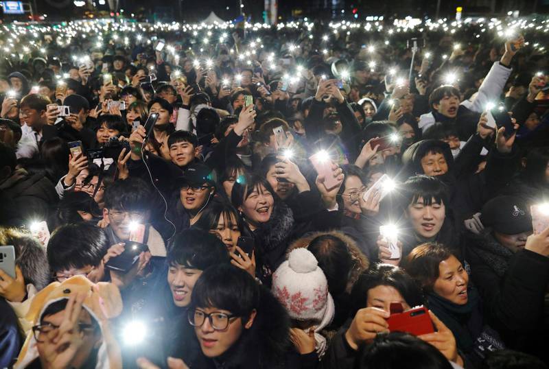 People attend a ceremony to celebrate the new year in Seoul, South Korea, January 1, 2019. Reuters